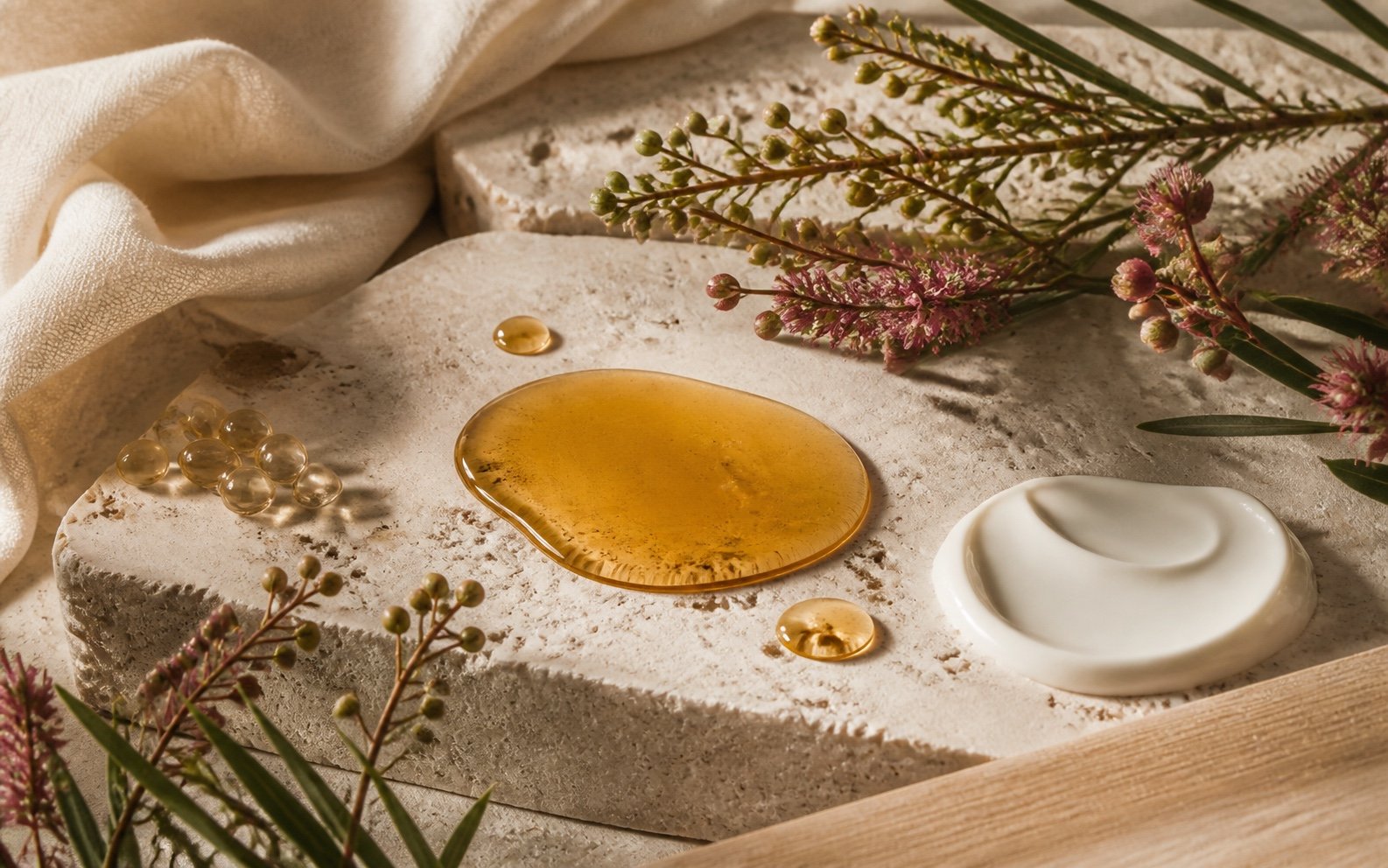 Amber CoQ10-inspired texture, golden ingredient capsules and native botanicals